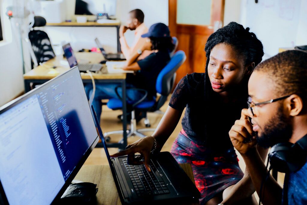 Man and woman at computer